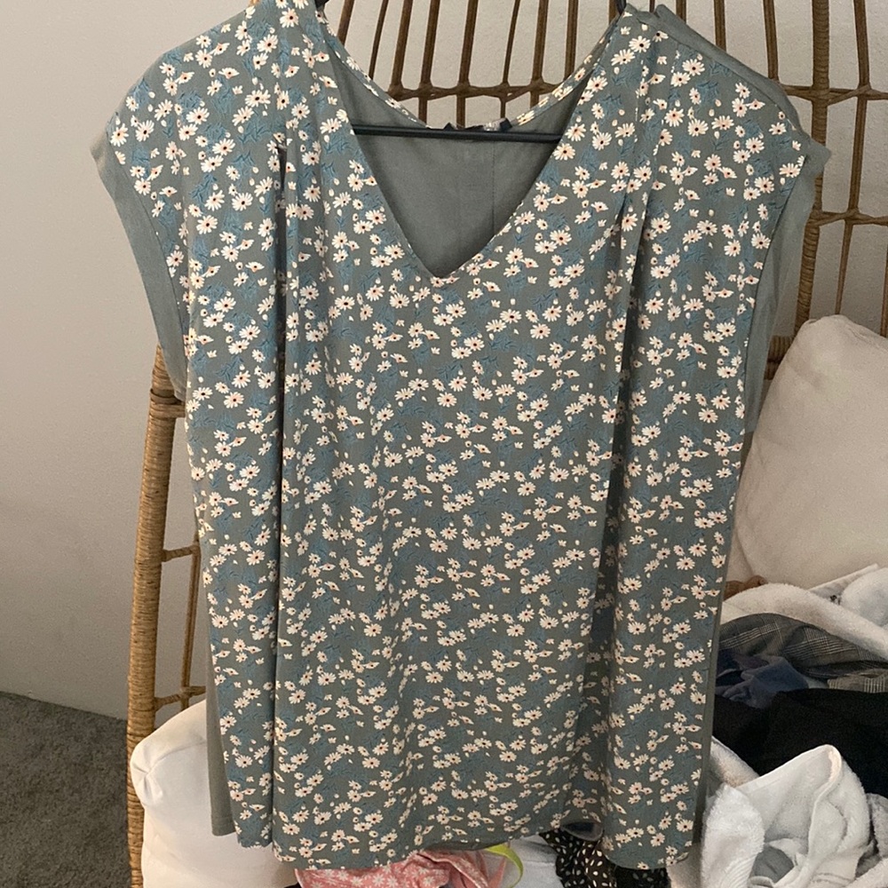 Green floral blouse.